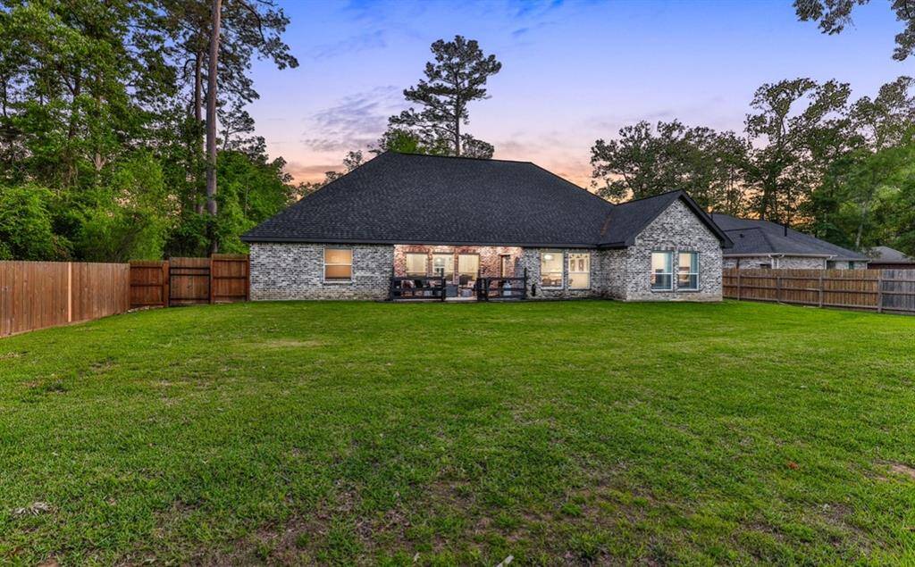 Rear of the home with plenty of room for a pool