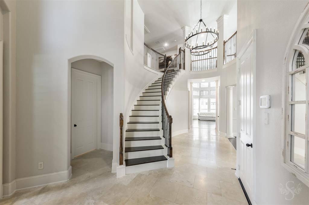 High ceilings throughout bring in lots of natural light and brighten this beautiful home!