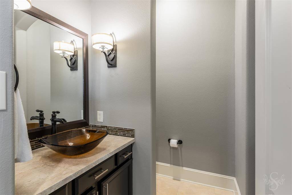 Half bath, located downstairs.