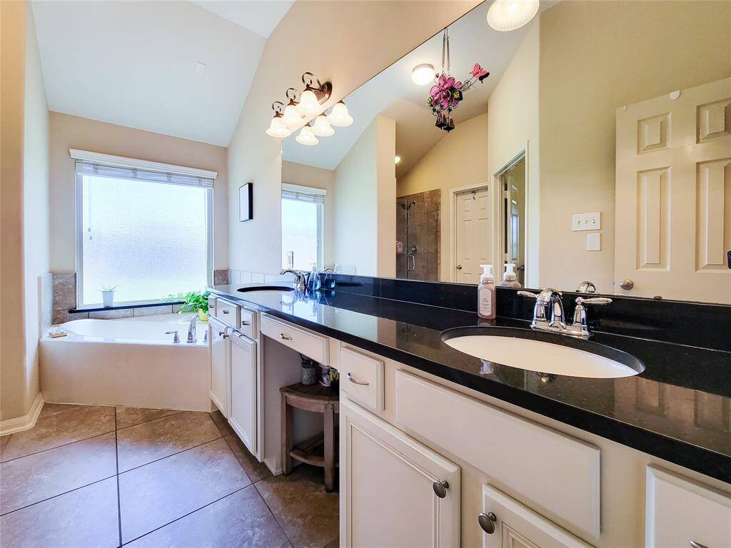 The countertops have been upgraded to match the granite in the kitchen