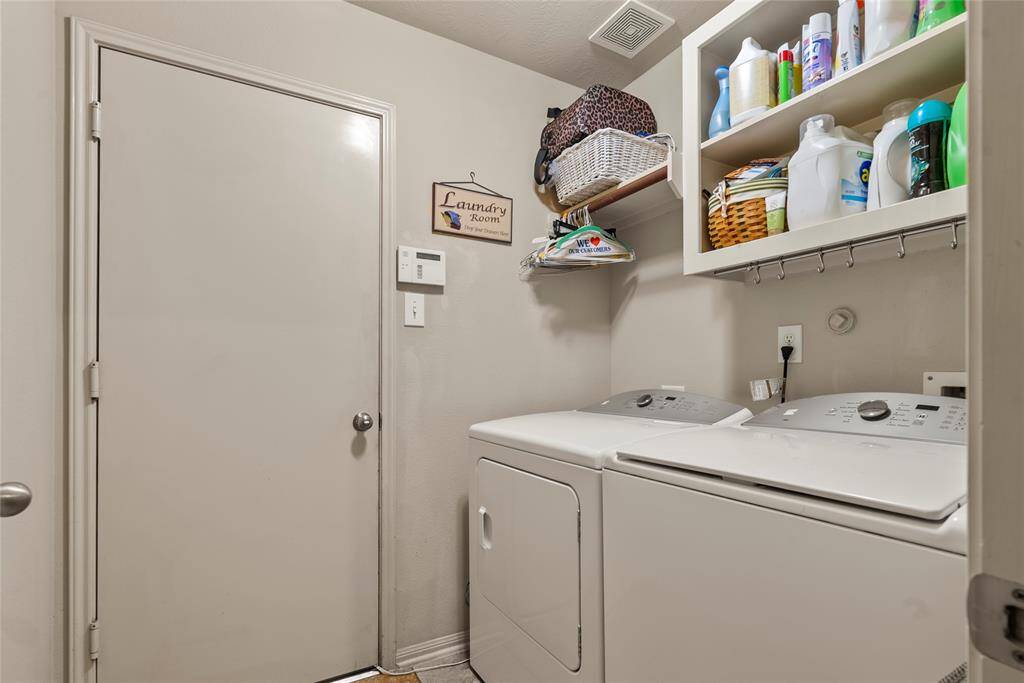 Utility room with added shelving for storage