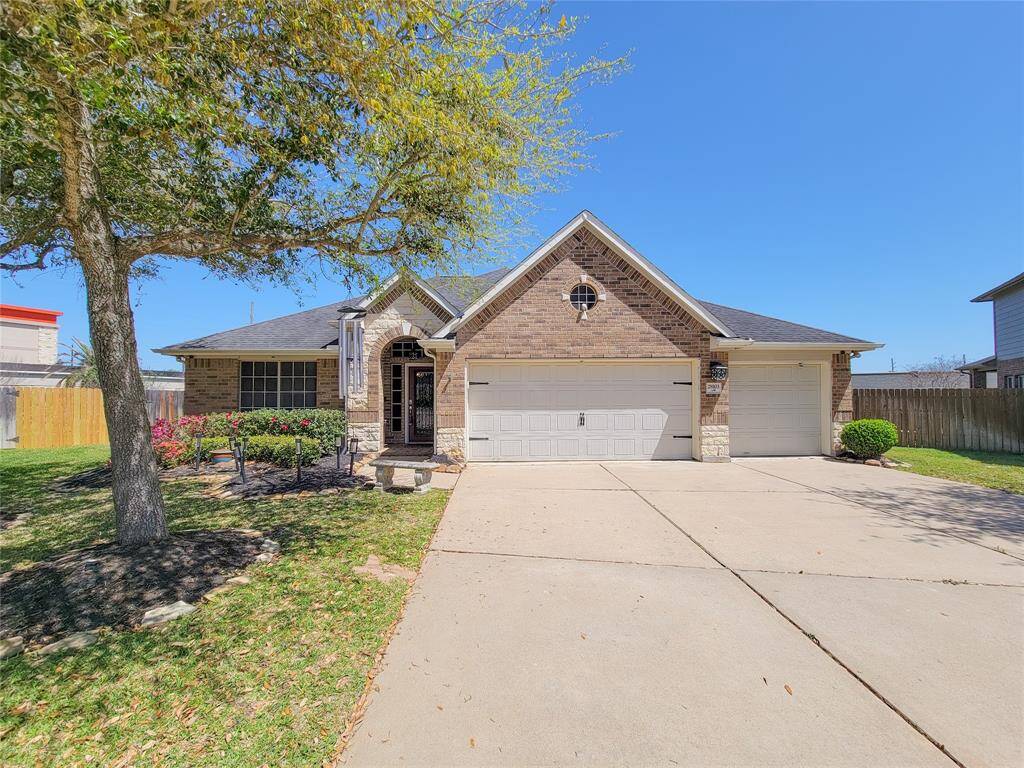 This charming one story features a three car garage and rests on a cul-de-sac lot!