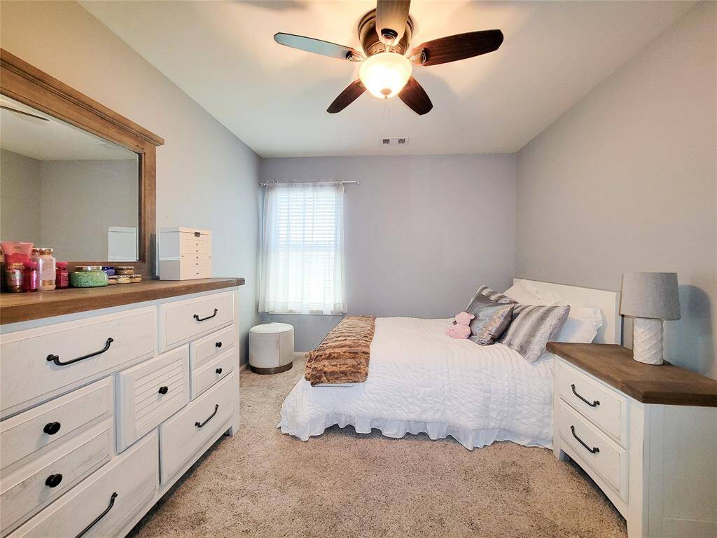 Bedroom at the end of the hall next to the secondary bathroom