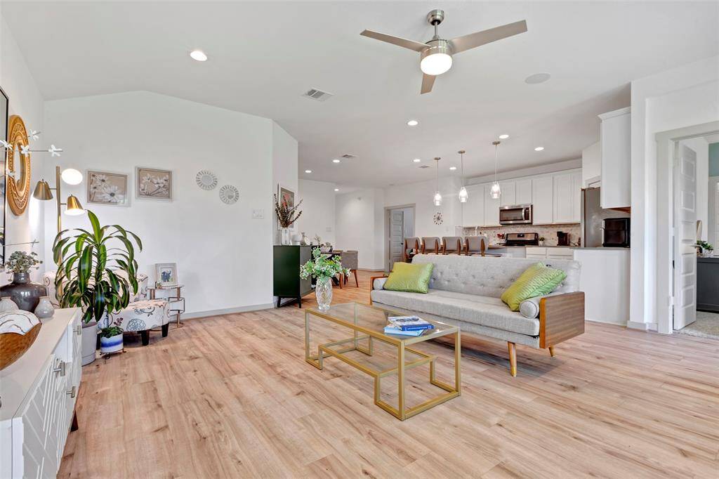 The spacious living area offers a blank canvas, ready to be customized to reflect your personal taste and style.