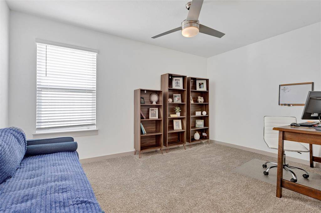 This versatile flex room, complete with double French doors and a carpeted floor, offers the perfect opportunity to be utilized as a fifth bedroom or a personalized space to suit your needs.