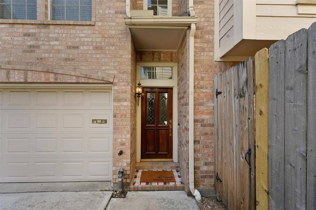 Built by Perry Homes with brick and hardi-plank exterior. Solid wood front door.