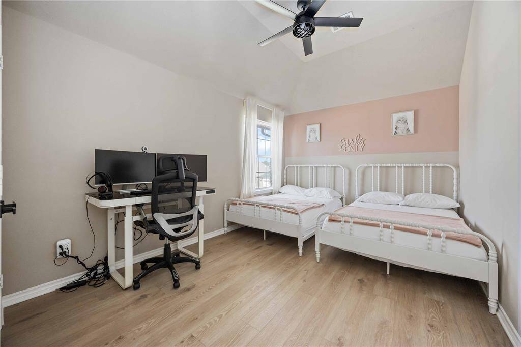 Spacious fourth bedroom located upstairs, offering comfort, natural light, and flexibility to suit a variety of needs — from a kid's room to a creative workspace.