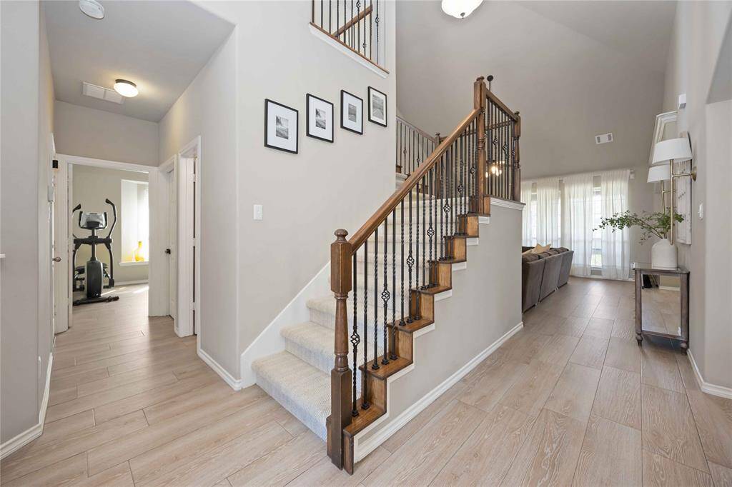 Natural light, soaring ceilings and sleek finishes welcome you home in style.