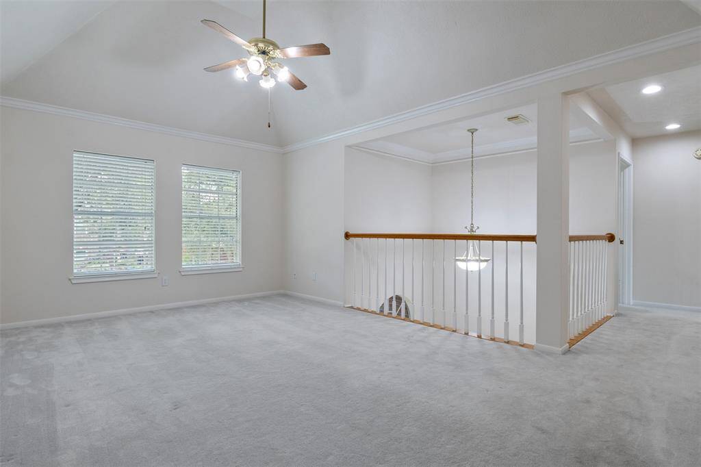 Walk up the stairs to discover the perfect man cave, game room, or home theater—ideal for children or teenagers. This spacious room offers plenty of room to create your own entertainment hub, with easy access from the upstairs bedrooms for added convenience.