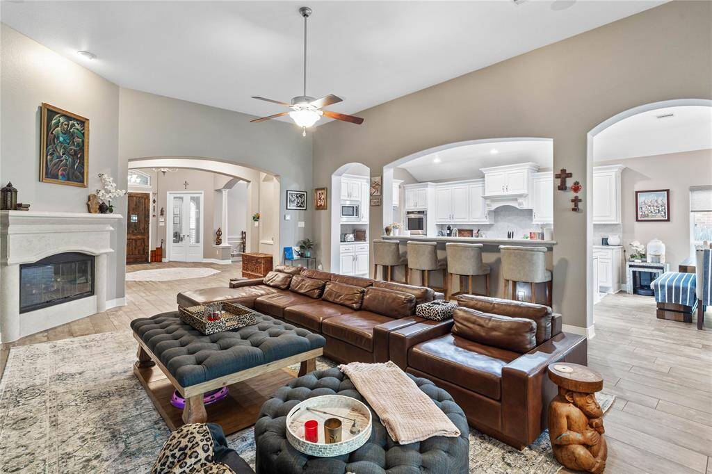 Kitchen, breakfast, and living room flow seamlessly.