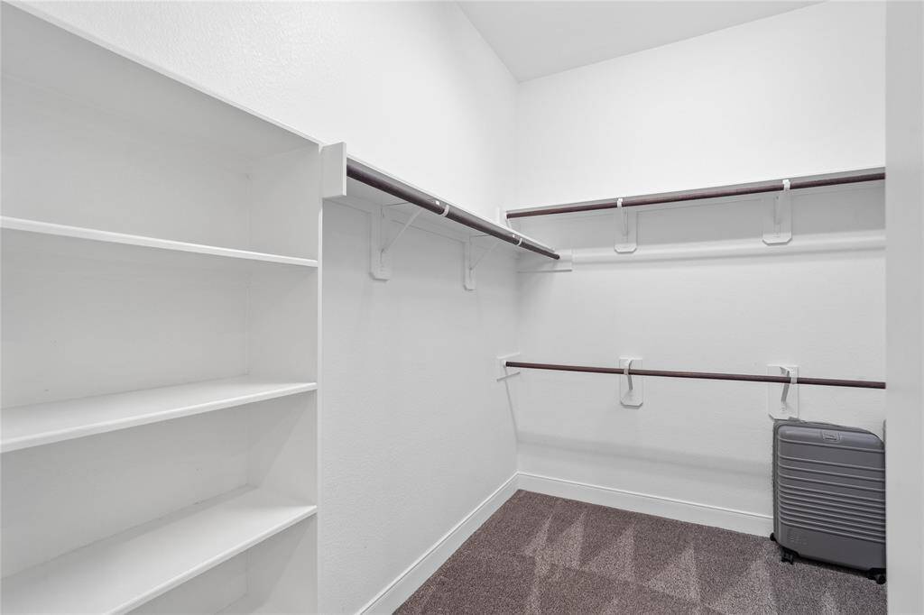 WIC with built-in shelves and multi-level storage racks.