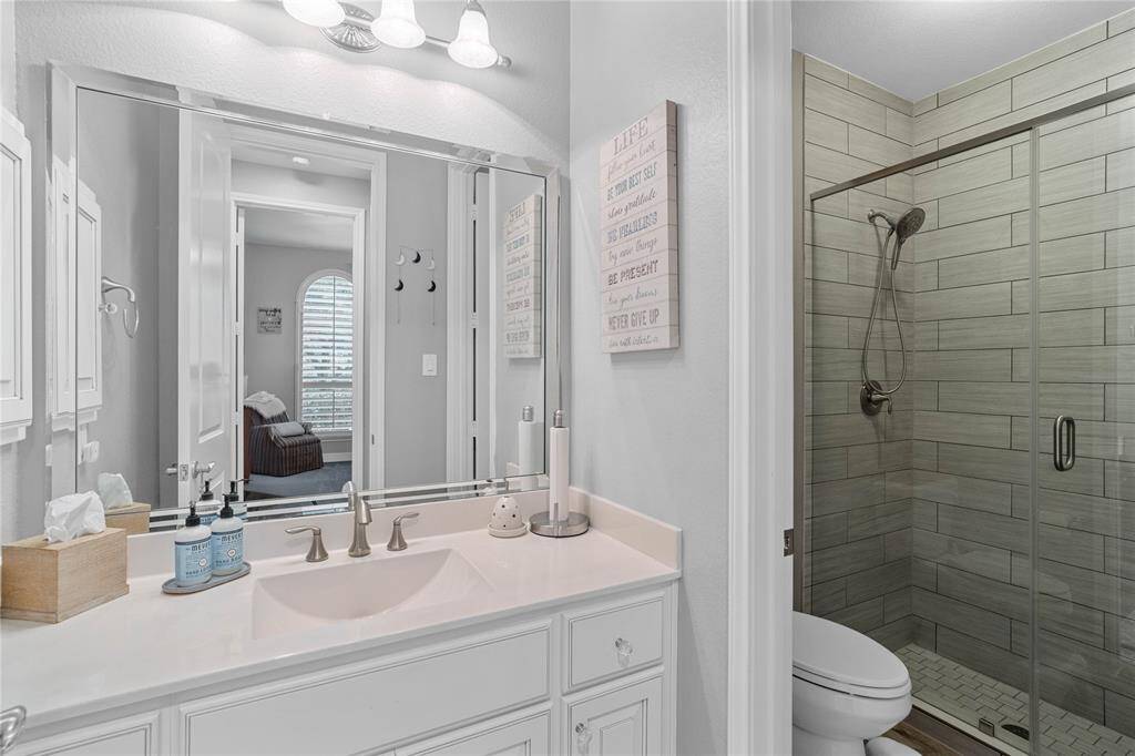 Shred secondary bathroom with walk-in shower.