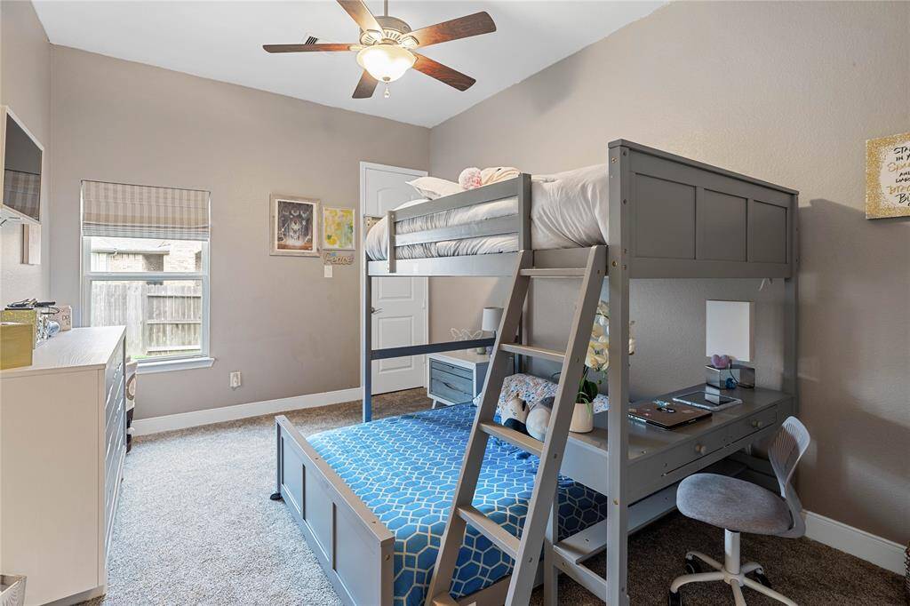 One of three secondarybedrooms.