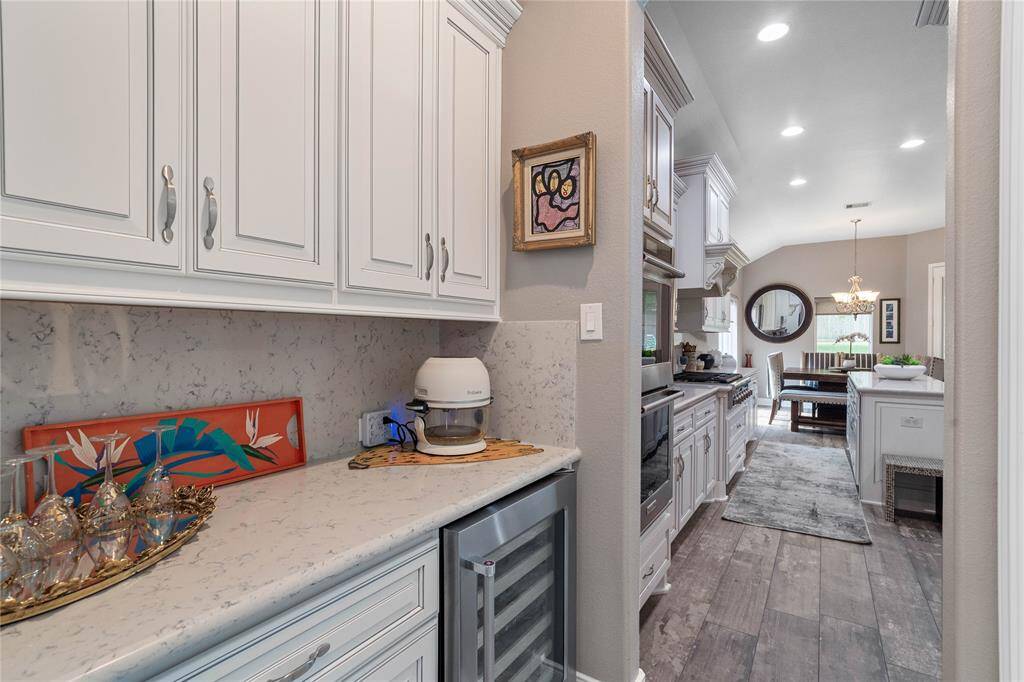 Butler's pantry area located between the kitchen and dining room.