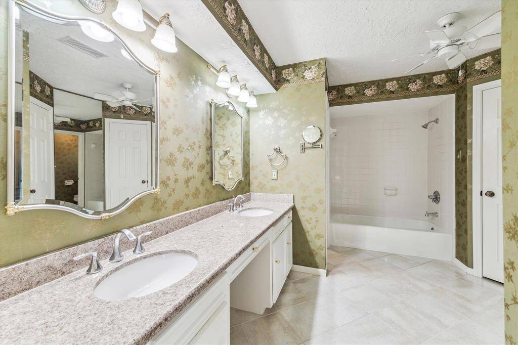 Primary bathroom has updated counters and mirrors