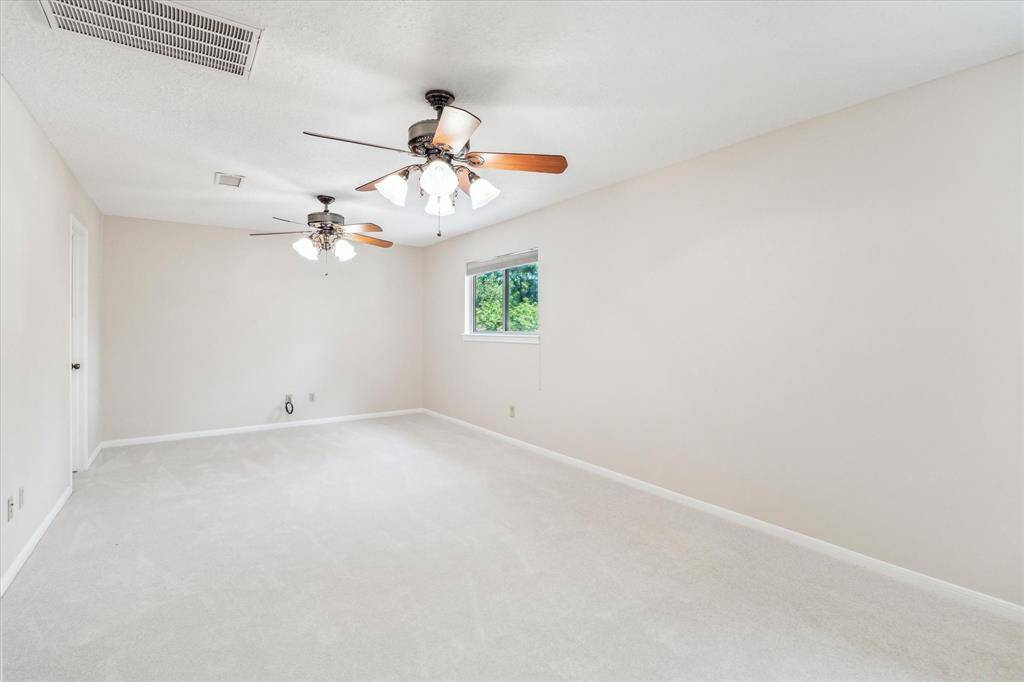 Upstairs game room - could be divided up to make a 4th bedroom with still room for a game room - this space is huge - new carpet - new paint