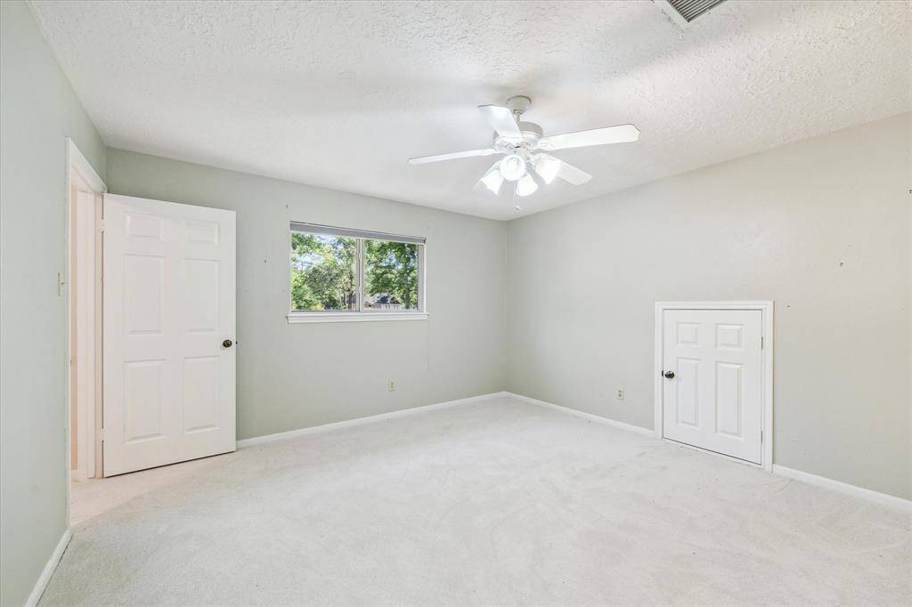 Bedroom #3 - has its own bathroom, huge closet and small door leads to Texas Basement