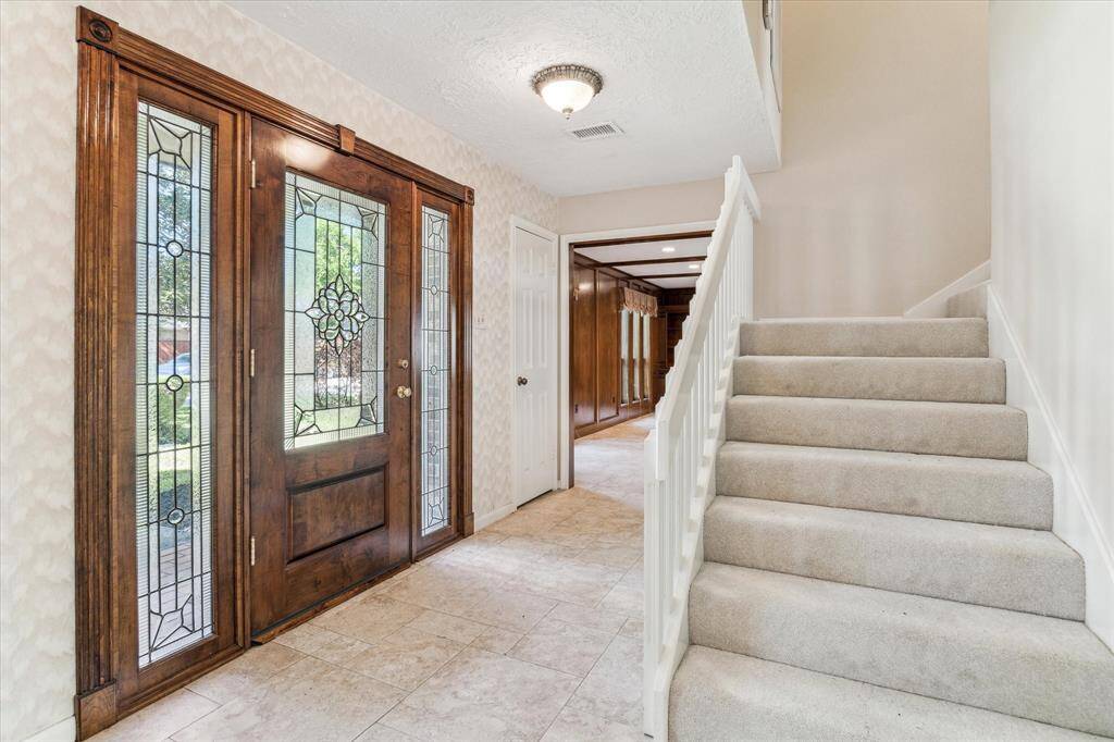 Front entry - gorgeous leaded glass door and side panels