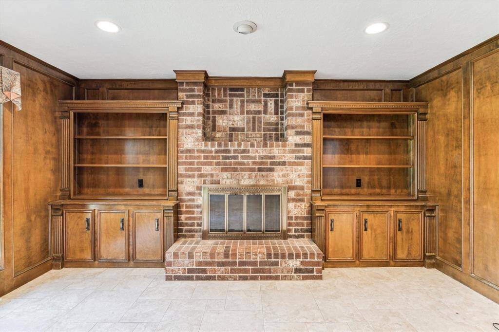 Great looking fireplace with built ins - a nice lime wash over the brick would look fantastic