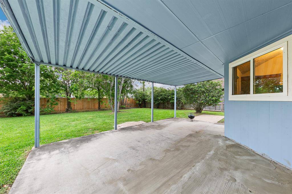 There is a large shady patio in the back yard, waiting for your chaise lounges, potted plants and bistro table!The weather is perfect for dining al fresco right now!