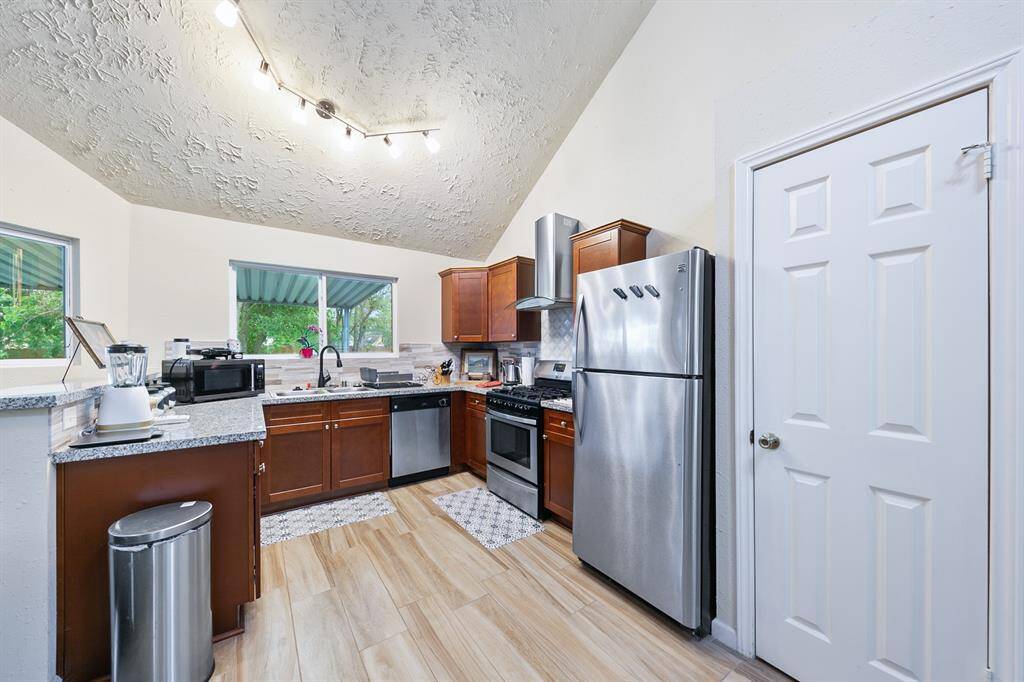 With a kitchen remodel to match the charm of the home, it has an open concept and is the heart of the home.
