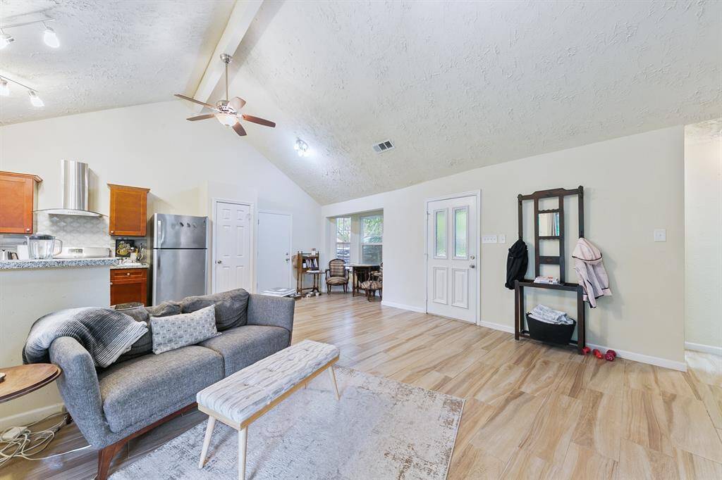 To the right of the fridge is the pantry, and to the right of that is the entry to the garage. The bay window area provides a great seating or dining opportunity.
