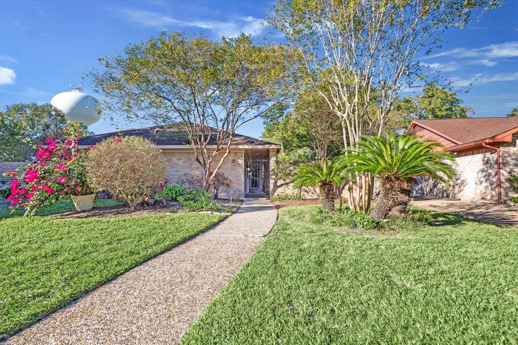Rare find in the beautiful Sugar Creek community! This home offers a flexible floor plan with multiple living and dining areas, a covered summer kitchen, and serene outdoor spaces. You'll find four spacious bedrooms PLUS guest quarters with living, bedroom & full bathroom. Truly a must see.