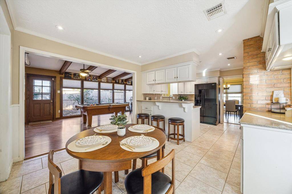 You’ll enjoy Wednesday night lasagna and Saturday morning pancakes in this charming breakfast area with plenty of room for your breakfast table.