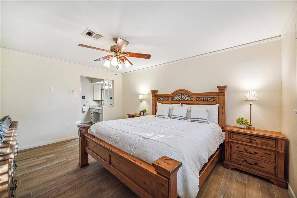 What a wonderful space to begin and end your day. This owner’s suite offers neutral finishes and ample room for your personal touches.