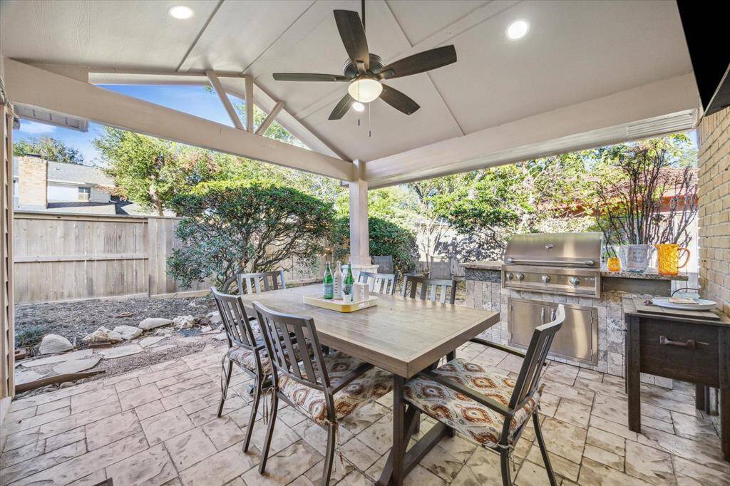 This space is perfect for fun BBQs and back yard birthday parties. With a cooling fan, recessed lights, and a summer kitchen, you can enjoy this area comfortably all year round.