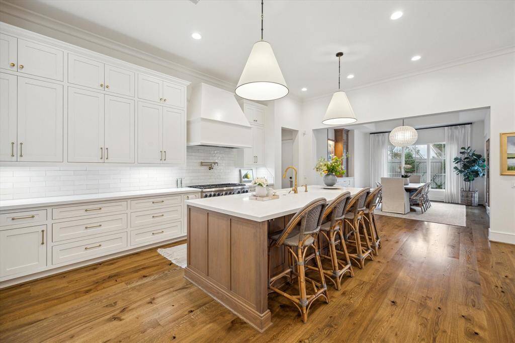Kitchen opens to dining area