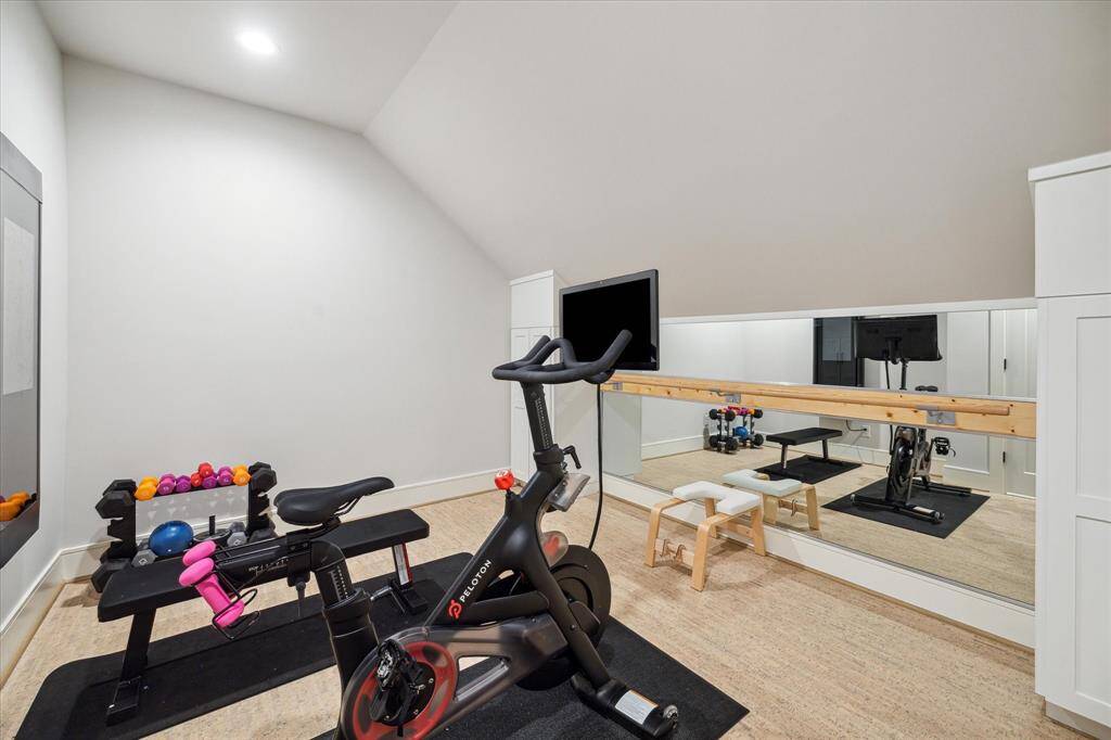 Exercise room. Perfect for getting a workout done at home. Custom barre to convey.