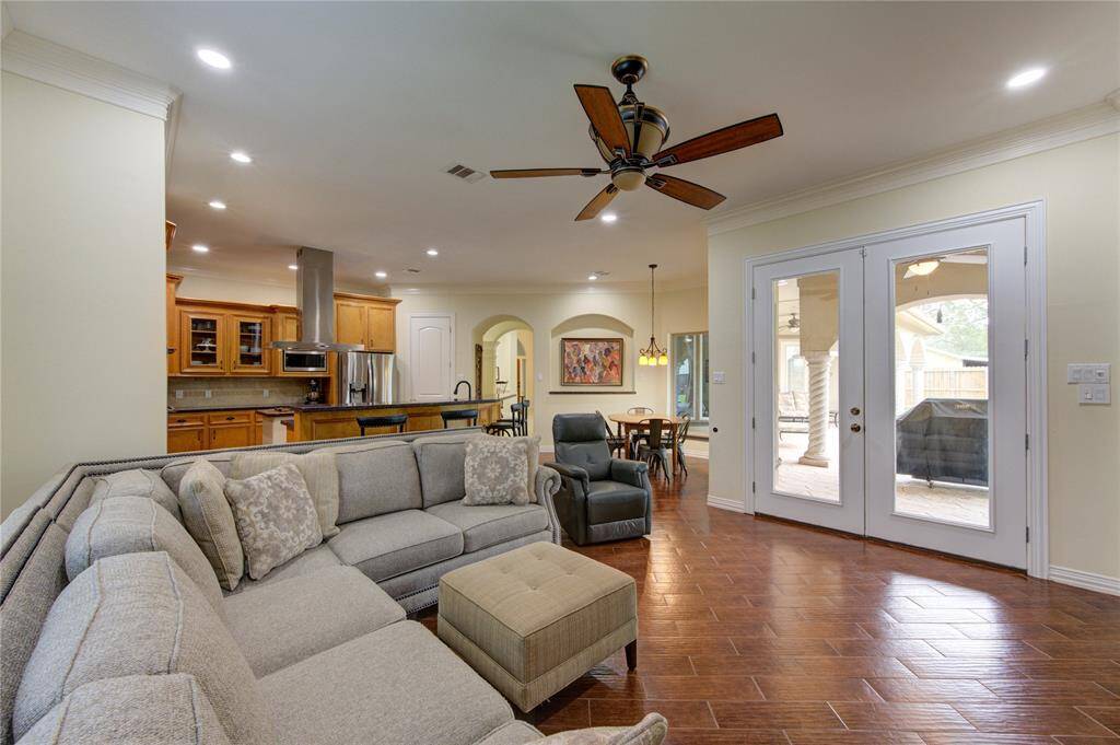 Addition of double door entry to veranda, bar, pool and all the fun/cool stuff this home has to offer.
