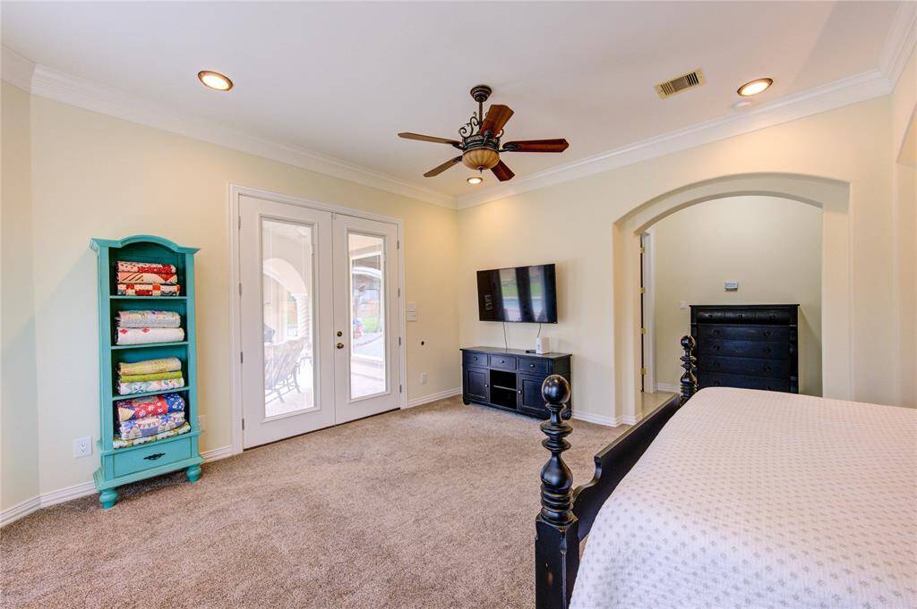 Alternate view showing the space and doors leading to pool area.