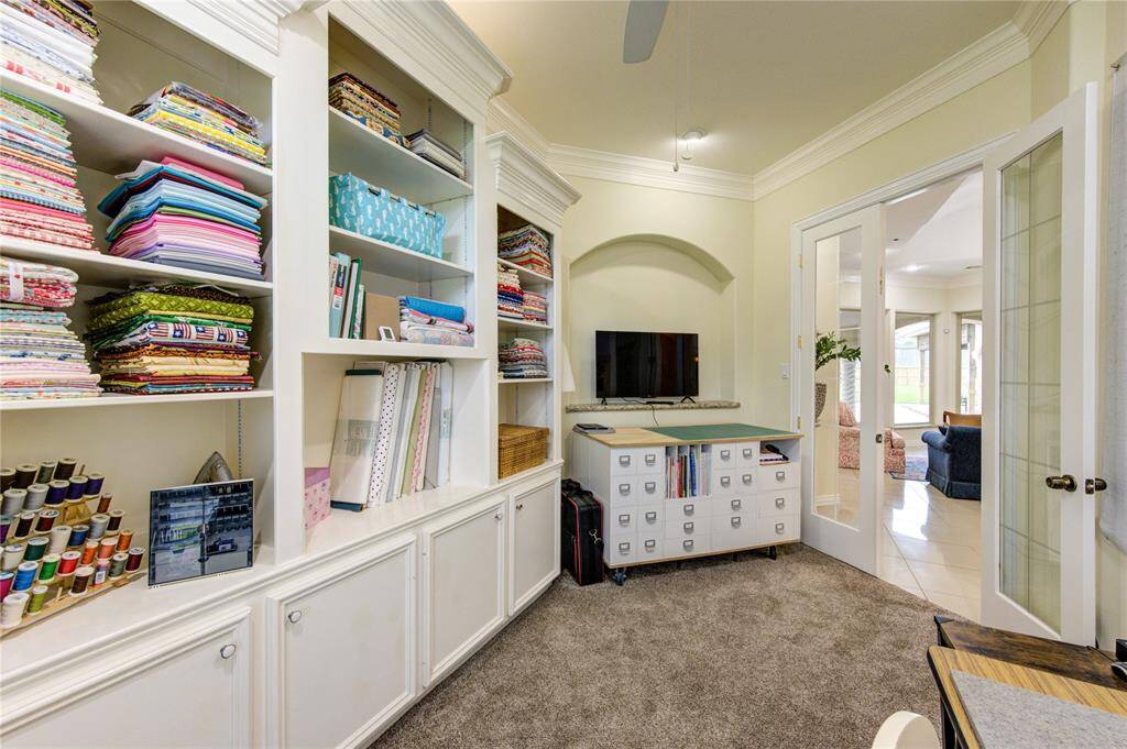 Double door entry to office provides a private quiet place to work or do crafts.