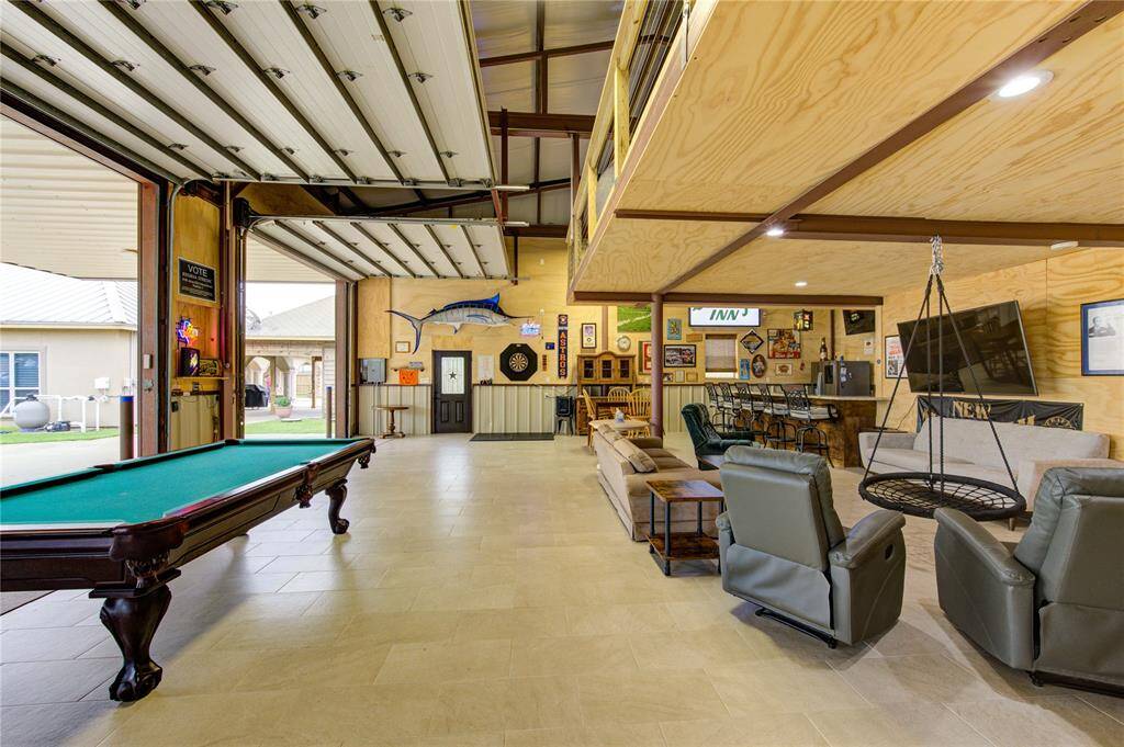 Poker, pool, darts? Plenty of room for multiple gaming tables, equipment, tables and chairs! Building is insulated, AC added and commercial grade fans to keep you comfortable!