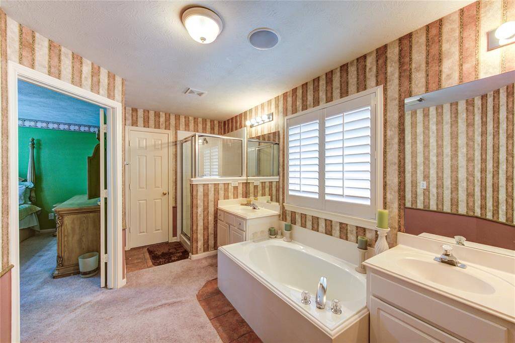 Primary bath is equipped for relaxing