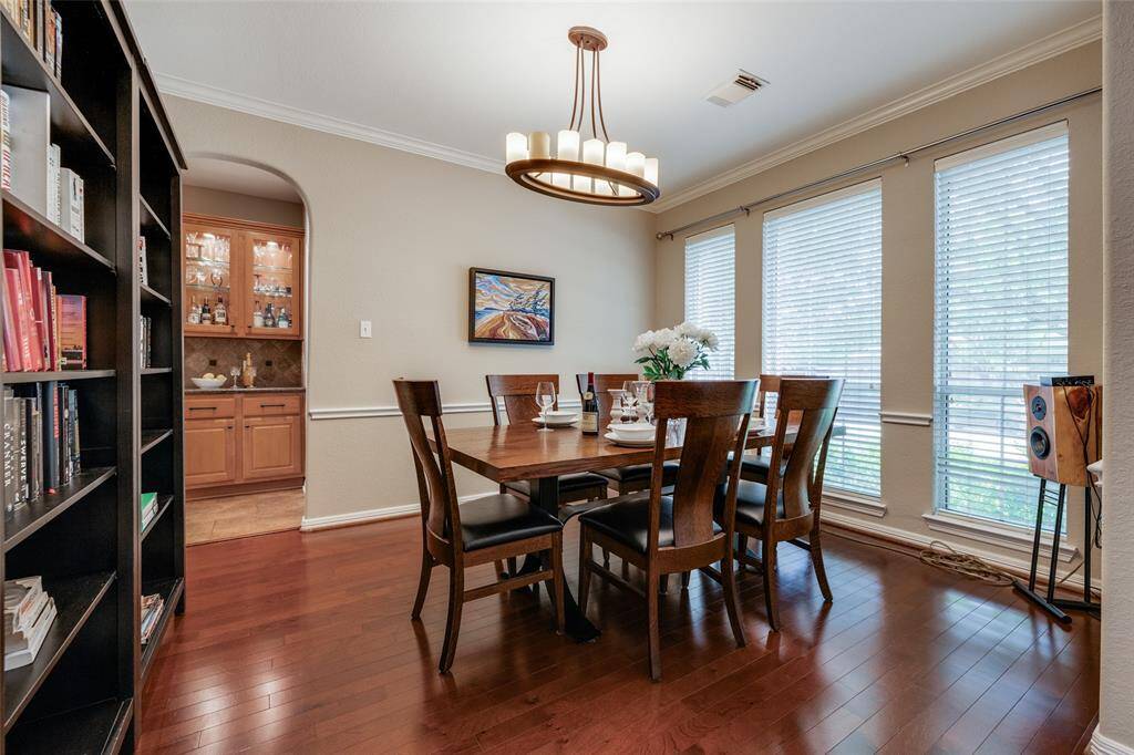 Large Dining Room to the front of the house - space for a large table and chairs, chandelier, 2 in blinds