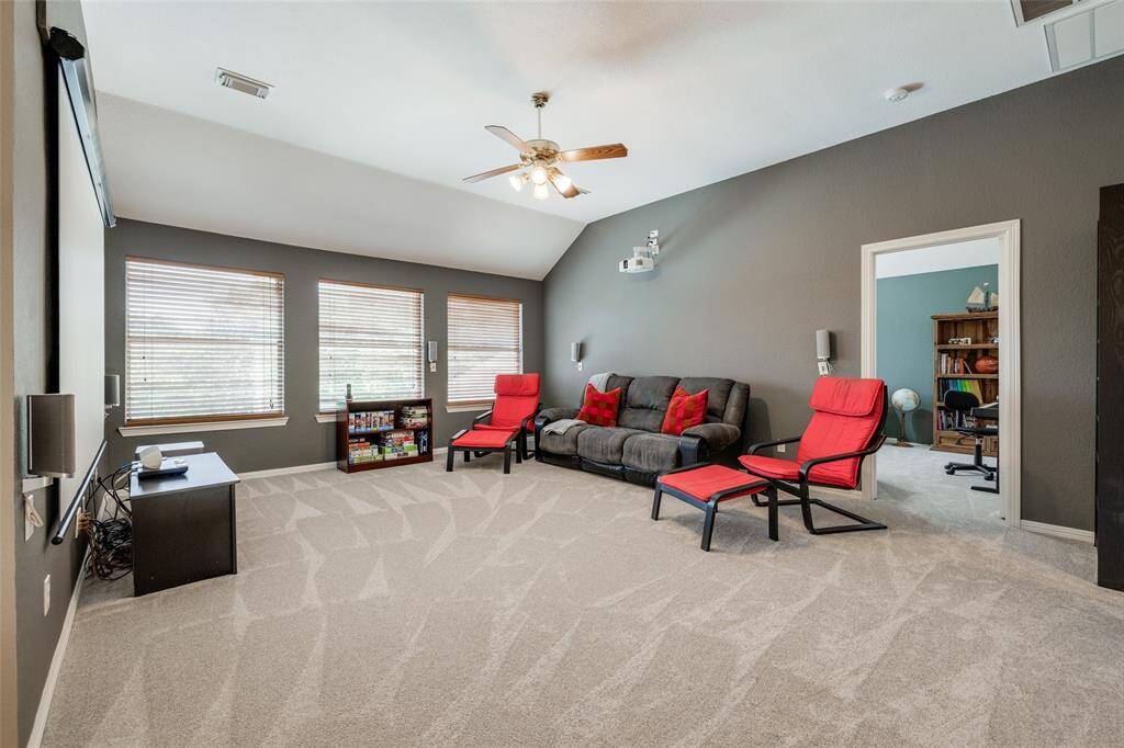 Huge Game Room wired for projector, screen and speakers - current equipment is excluded from the sale, ceiling fan, 2 in blinds