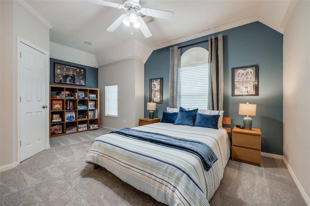Large Bedroom 4 with carpet, large closet, high ceiling, ceiling fan & 2 in blinds