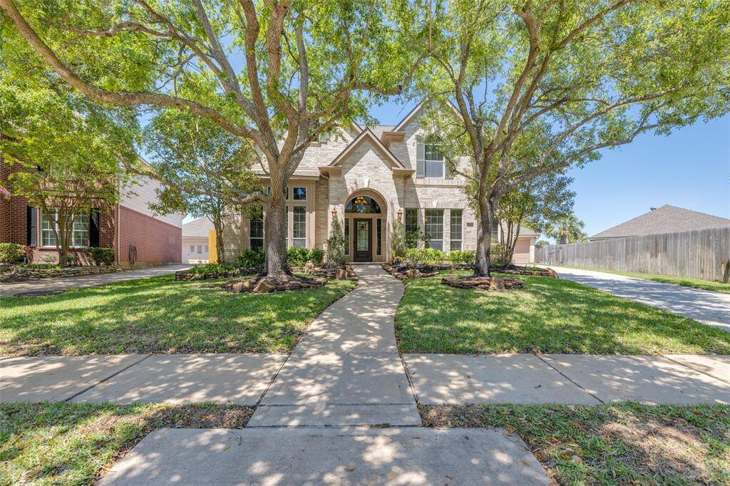Fabulous quiet, private back yard with huge deep swimming pool with water falls, huge covered patio great for entertaining with family & friends and lots of extra deck space !