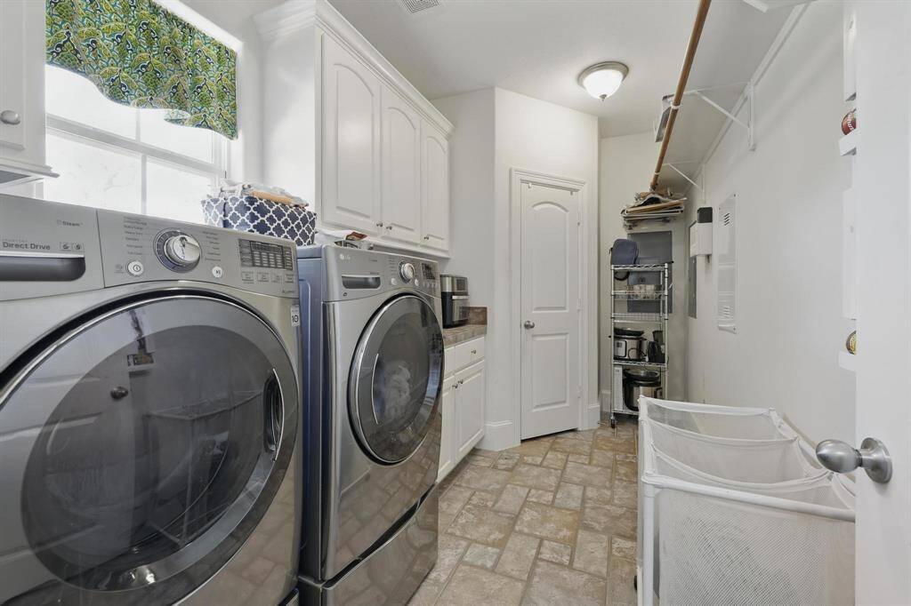Spend less time doing your laundry and more time enjoying your property.  This utility room allows you to efficiently getting the chores done.  Washer and Dryer included!
