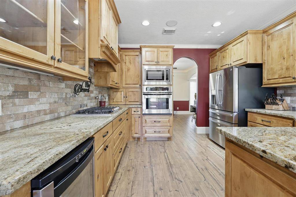 Create lasting memories in this spacious kitchen—perfect for holiday gatherings and meal prep with the whole family. There's plenty of room for everyone to pitch in, and the refrigerator is included!