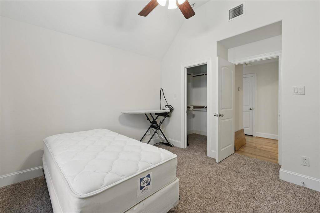 Upstairs bedroom offers ample closet space, providing plenty of room for storage and organization.