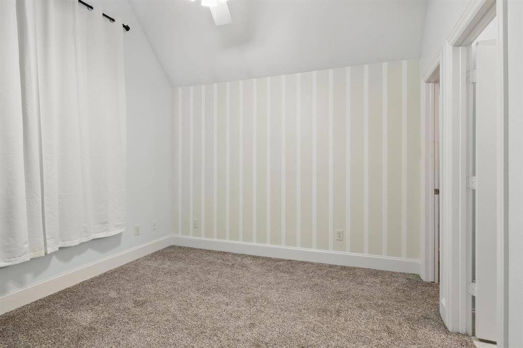 This upstairs bedroom offers exceptional privacy—an ideal retreat for guests, teens, or anyone seeking a quiet, personal space.