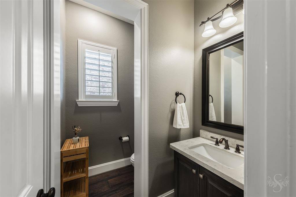 Half bath, located downstairs.