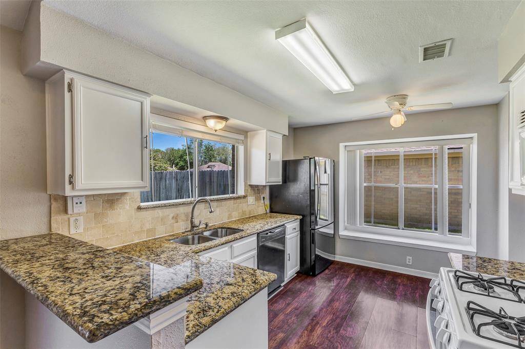 A detailed view of the kitchen's thoughtful layout, highlighting its efficient design and functional flow.