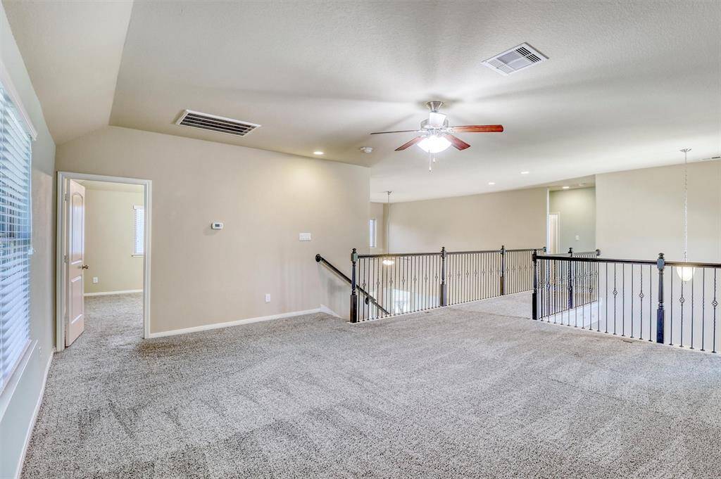 Enjoy the open feel and stunning iron spindle railing that overlooks the foyer and family room, keeping everyone connected while creating a space all its own.