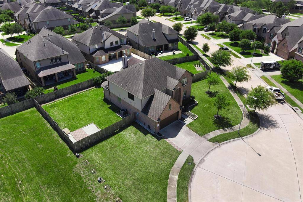 The expansive lot offers endless potential—with a fully fenced backyard and no side neighbors for added privacy.
