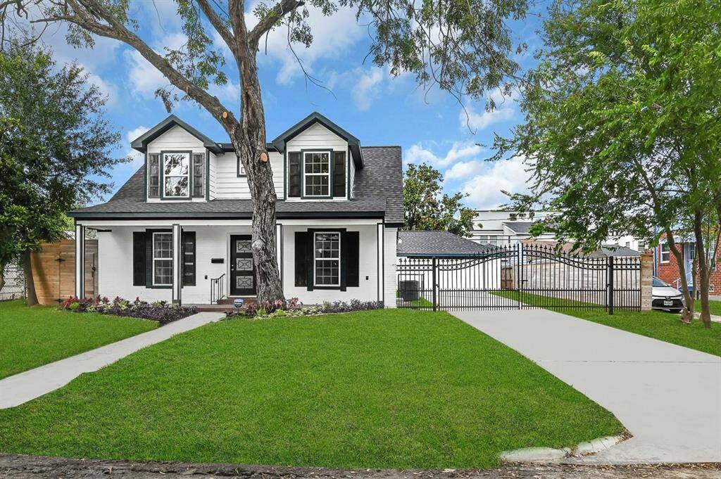 Welcome home to 3343 Tampa Street, boasting a private gate to access the backyard and garage.
